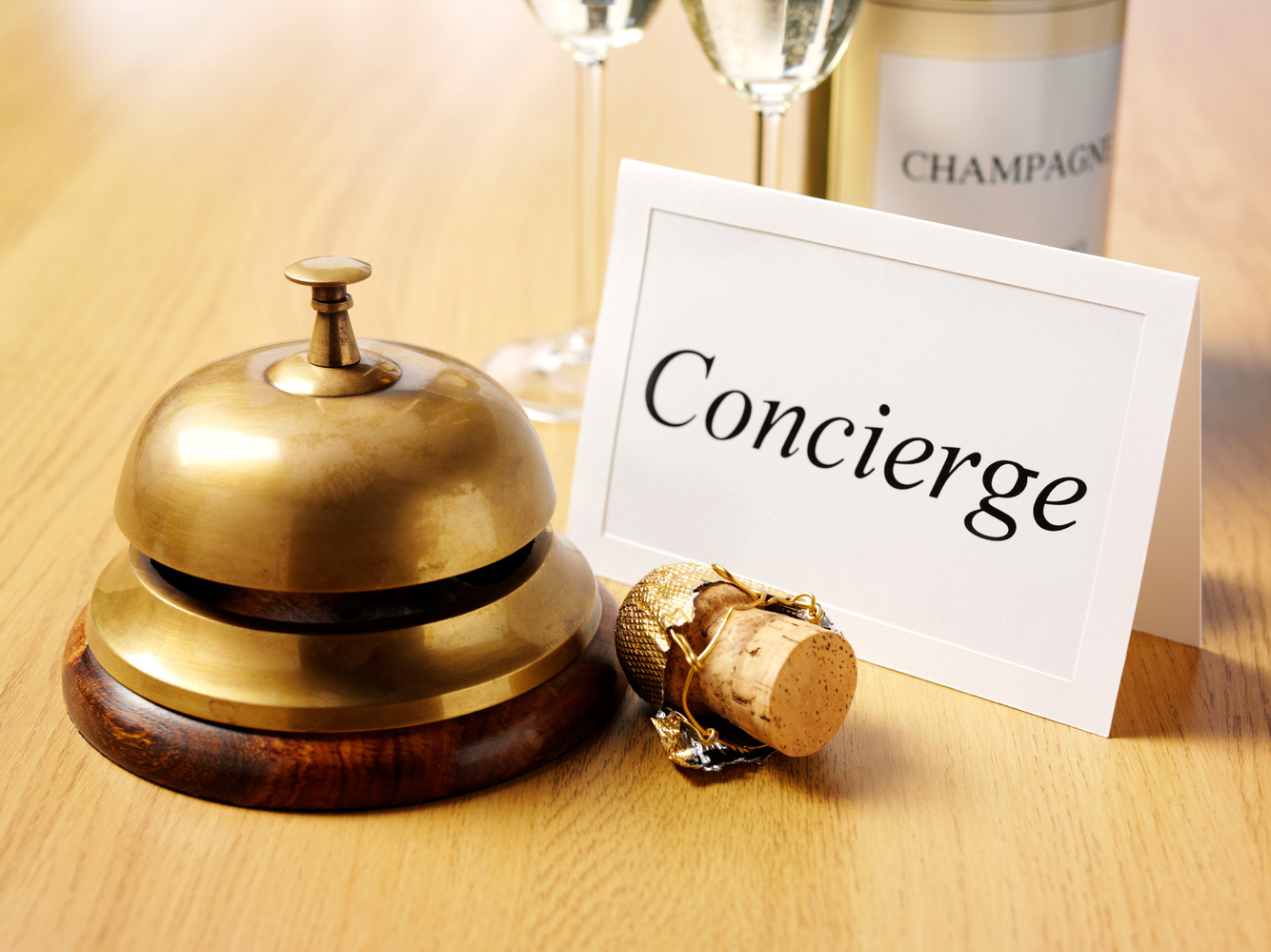 Concierge Card by a Brass Bell